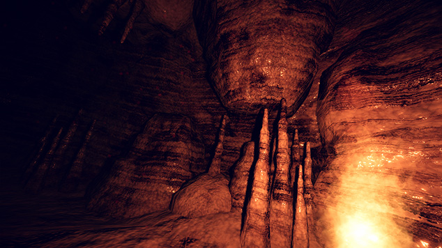 大きな岩と炎があるオレンジ色のCave Mapの洞窟